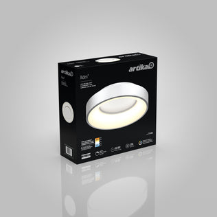 Black box packaging for the Artika Aiden LED flush mount features a picture of the round, white ceiling light and displays key features and specs with icons and text on the front and sides.