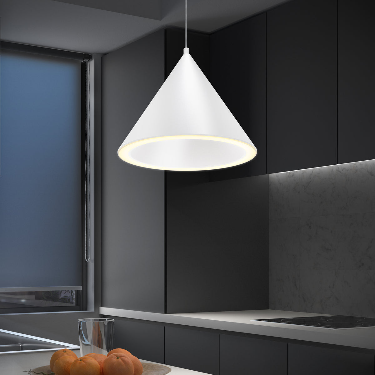 Artika Denali modern LED pendant light 3 CCT hangs over a dark-cabinet kitchen with peaches, offering adjustable color temperatures.