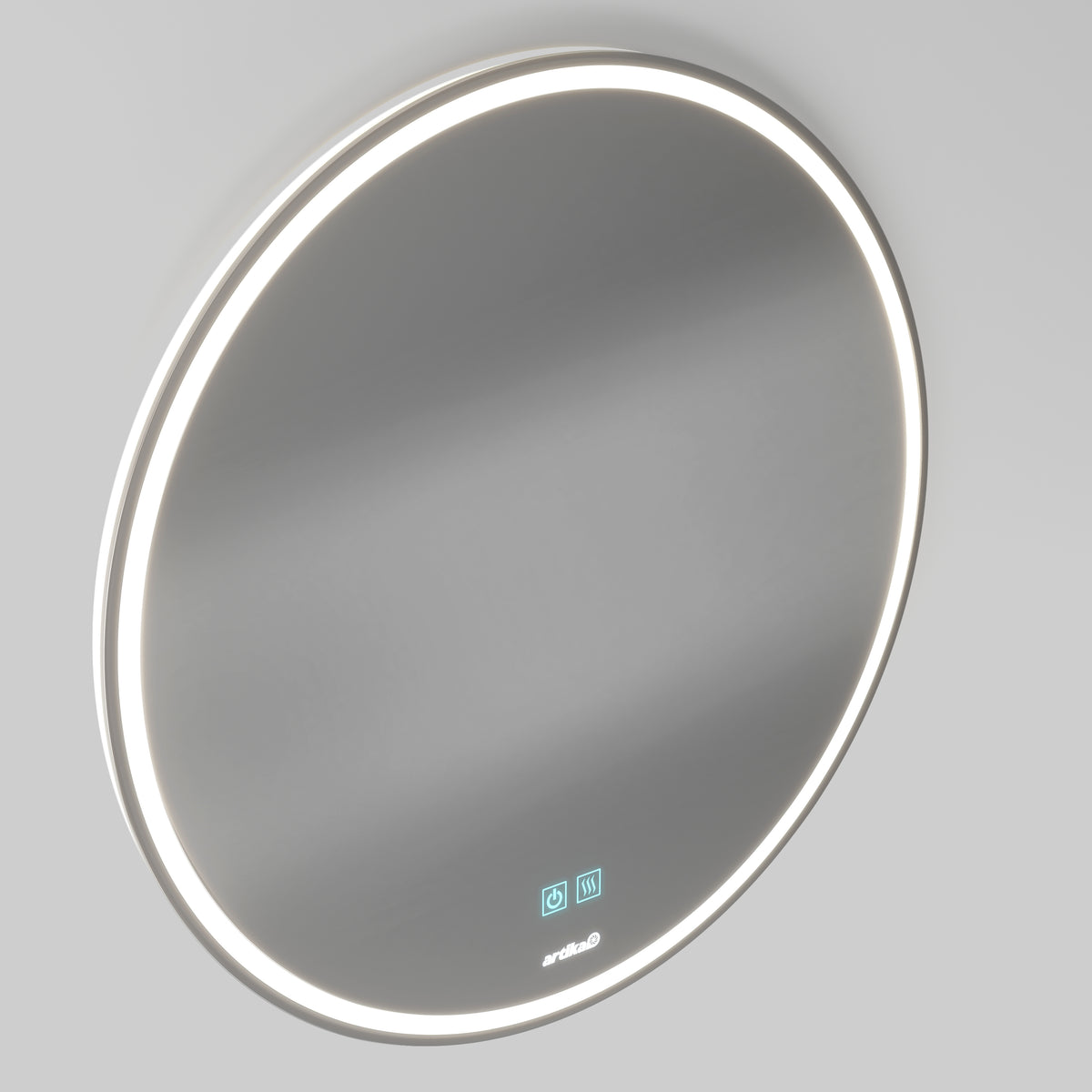 A round, wall-mounted mirror with an illuminated LED light border and touch control icons displayed on the lower part of the glass. The mirror is set against a plain, light gray background.