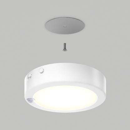 The illuminated Accent under cabinet LED light 3CCT by Artika is displayed below a gray mounting plate and screw, demonstrating installation against a plain gray background.