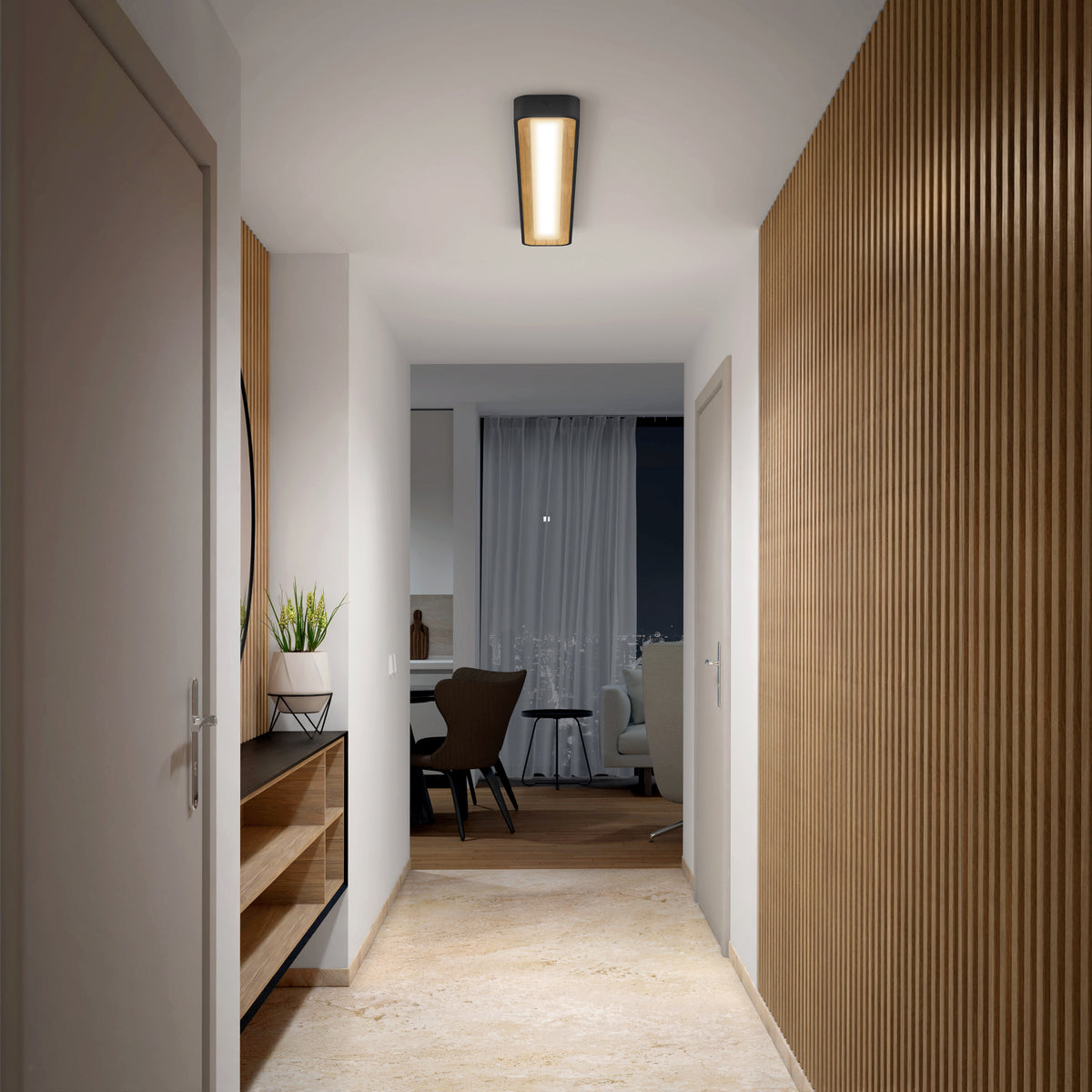 A modern hallway with wooden floors, white walls, and vertical wood paneling on the right. A console with decor is on the left. The hallway leads to a room with a table, chairs, and a large window with curtains.