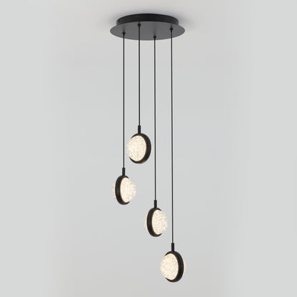 The Avalon 4-light LED pendant by Artika features four textured glass pendants hanging at varied lengths from a round black base, creating a modern ceiling light accent.
