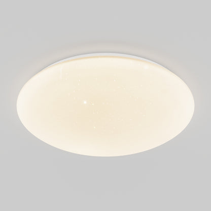 The Artika Empress 13 in. LED modern flush mount light creates a soft, warm glow with a subtle starry pattern, adding elegance to any space with its round white design.