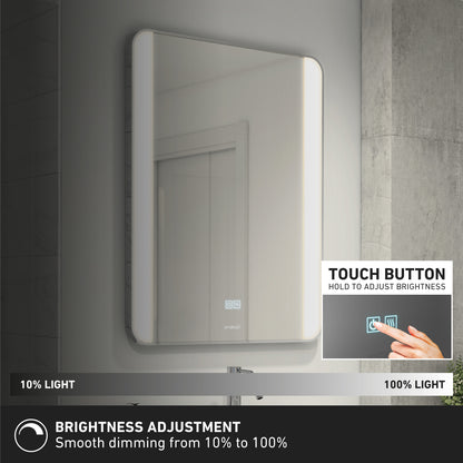 The Artika Onyx dimmable LED mirror 3 CCT features touch button controls for smooth brightness adjustment from 10% to 100%. An inset image displays a finger pressing the touch button on this stylish rectangular bathroom mirror.