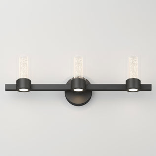Artika's Novello modern LED bathroom vanity light features three bubbled glass shades on a black circular base.