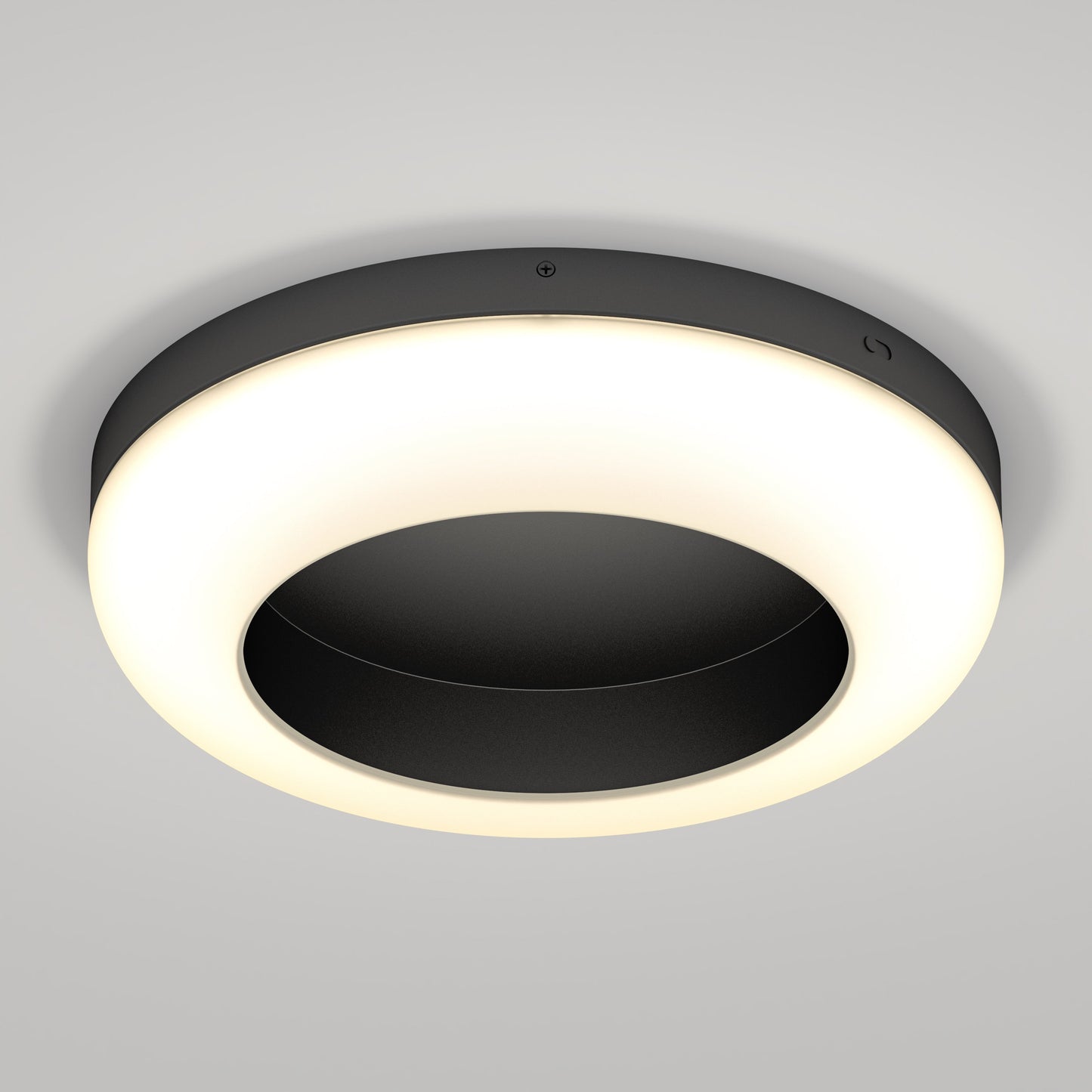The Louka 15 in. modern LED flush mount light by Artika-CAN-dev features a circular design with a black center and glowing white ring—ideal for adding contemporary elegance to any space.