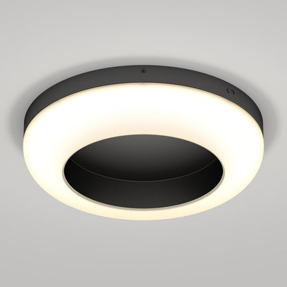 The Louka 15 in. modern LED flush mount light by Artika-CAN-dev features a circular design with a black center and glowing white ring—ideal for adding contemporary elegance to any space.