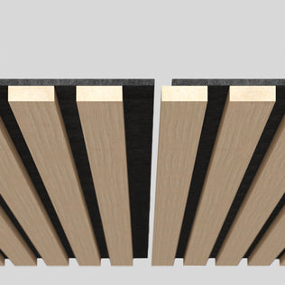 Close-up of two Artika Sonofold sound-absorbing wall panel kits (pack of 2) with black backing, featuring alternating light and dark wood slats separated by a gap, set against a plain light gray background.