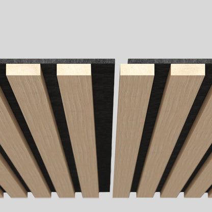 A close-up view of two parallel wooden slat panels with black backing, viewed from above against a light gray background. The panels are separated by a narrow gap.