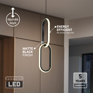The Artika Catena LED pendant light features two interlocking oval LED rings, a matte black finish, adjustable height, energy efficiency, integrated LED tech, 5 CCT settings, and a 5-year warranty—perfect for modern kitchens.