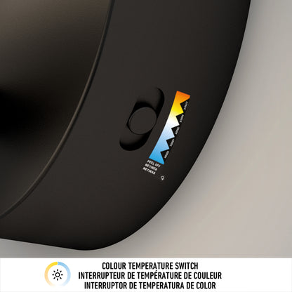 A close-up of Artika’s Chorus LED Wall Light, showing a sliding switch to adjust color temperature with a cool-to-warm gradient label. “COLOUR TEMPERATURE SWITCH” appears below in three languages.