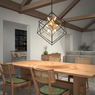 Modern dining room featuring a wooden table, four chairs, Artika Imperium 9-light chandelier, beams, large window, and plants.