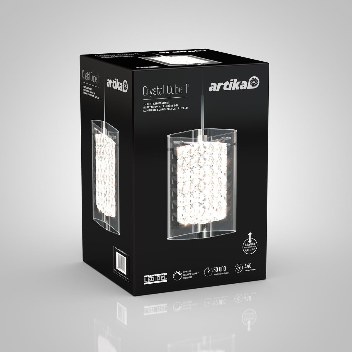 A black box with Artika branding displays the Crystal Cube 1-light LED pendant, featuring a cube design with sparkling crystal elements. Product features and technical details appear on a gray background.