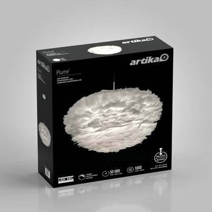 A black Artika box displays the Plume LED pendant light with a white, feather-like design. The front highlights features such as adjustable height and long lifespan with icons and product details.
