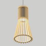 A modern pendant light with a cylindrical wooden slat design, widening at the bottom. The light bulb is visible inside, and the fixture hangs from a thin black cord against a plain gray background.