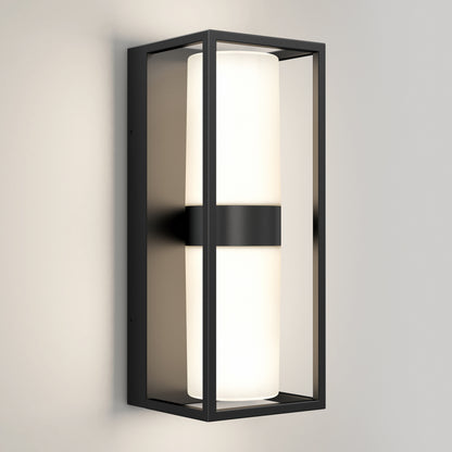 The Artika Sherman modern LED indoor-outdoor wall light 5 CCT features a rectangular black metal frame with a cylindrical white frosted glass, shown mounted on a plain light-colored wall.