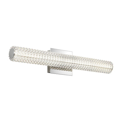 The Artika Exalto LED bathroom vanity light features a modern cylindrical design with sparkling crystals and mounts on a rectangular chrome base.