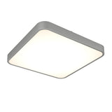 A modern, square-shaped LED ceiling light with rounded corners and a silver frame, emitting a bright, even glow.