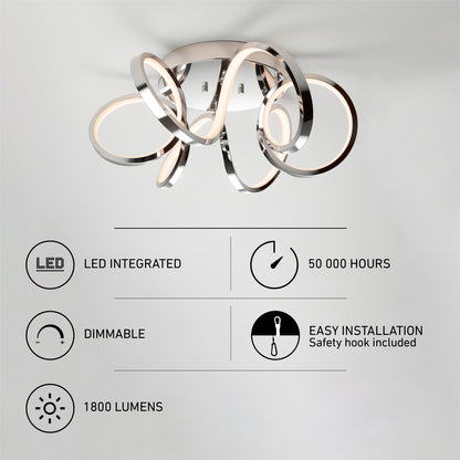 The Artika Swirl Ribbon flush mount light is a modern chrome LED ceiling fixture with intertwined rings, 1800 lumens brightness, 50,000-hour lifespan, dimmable settings, easy installation via safety hook, and feature icons with text.