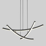 Modern chandelier with three curved, intersecting LED light bars suspended from the ceiling by thin black cords, set against a plain gray background.