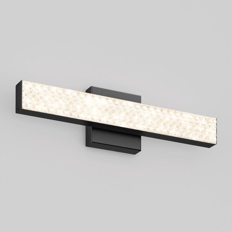 The Adeline 18-in LED Vanity Light Bar by Artika features adjustable color temperature and a textured front panel with black base.