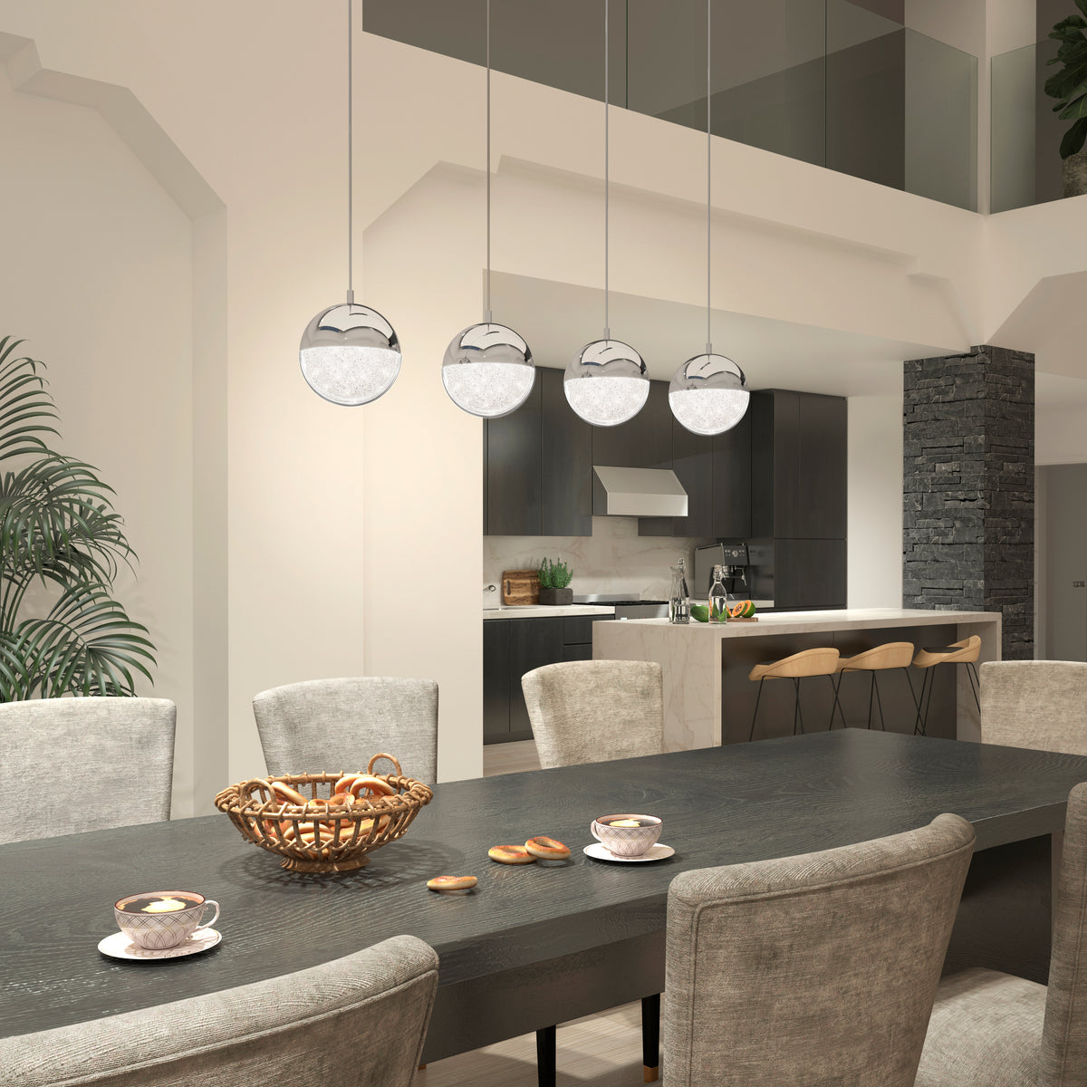 A modern dining area features a dark table, upholstered chairs, and pastries under the Artika Sparkle 4-light LED pendant. Teacups sit on the table, with a chic kitchen and bar stools visible in the background.