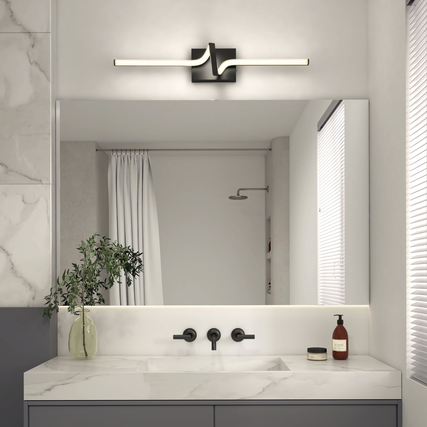 A modern bathroom features the Artika Bowtie modern LED bathroom vanity light 5 CCT above a large mirror, dual sinks with matte black fixtures, a potted plant, soap dispenser, and marble and gray finishes for a clean, minimalist style.