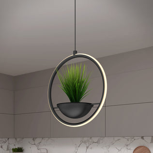 The Artika Colin LED modern planter pendant light 5 CCT features a circular LED frame and black pot with green artificial grass, hanging in a minimalist kitchen with gray cabinets and a marble backsplash.