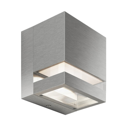 The Artika Valor Square LED indoor-outdoor wall light features a modern brushed metal design with frosted glass panels on the sides and bottom, emitting a soft white glow.