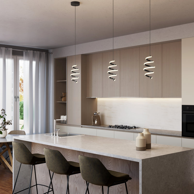 Modern kitchen featuring a light wood island, three dark cushioned bar stools, built-in cabinets, stove, oven, and large windows with sheer white curtains. Decorative lighting provided by Artika Chorus 1-light LED pendant 5 CCT above the island.