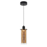 Modern pendant light with a cylindrical, perforated gold metal shade inside a clear glass outer cylinder, hanging from a black cord and ceiling mount.