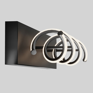 The Artika DNA modern LED bathroom vanity light features three glowing loops, a black base, and integrated LEDs in a sleek design.