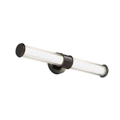 The Artika Kendra LED contemporary bathroom vanity light features a cylindrical glass shade and black circular base, wall-mounted and displayed against a white background.