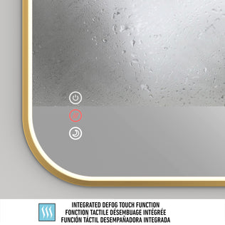 Close-up of the Artika Royce Dimmable LED Mirror’s corner shows its touch panel with a glowing red defogger button. Multilingual text below highlights integrated defog touch and adjustable 3 CCT colour temperature. Mounts horizontally or vertically.