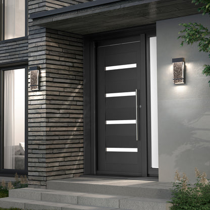 A modern front entrance with a dark gray door featuring horizontal frosted glass panels, brick and smooth concrete exterior walls, and Artika Skyler indoor-outdoor LED wall lights flanking the doorway.