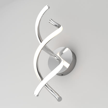 A modern wall-mounted LED light fixture featuring two intertwined, curved metallic strips—one illuminated—against a plain white background.
