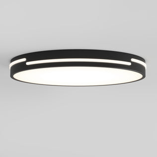 The Artika Delray 15.7 in. LED modern flush mount light features a black outer ring, glowing white center, horizontal edge slits for accent lighting, and is mounted on a plain white ceiling. Offers 5 CCT options for customizable ambiance.