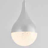 A modern pendant light with a teardrop-shaped white fixture and a textured, glowing lower half, suspended against a plain light gray background.