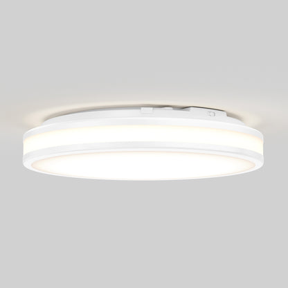 The Artika Hemisphere 15 in. LED flush mount light is installed on a plain light grey ceiling, casting a soft and even glow.