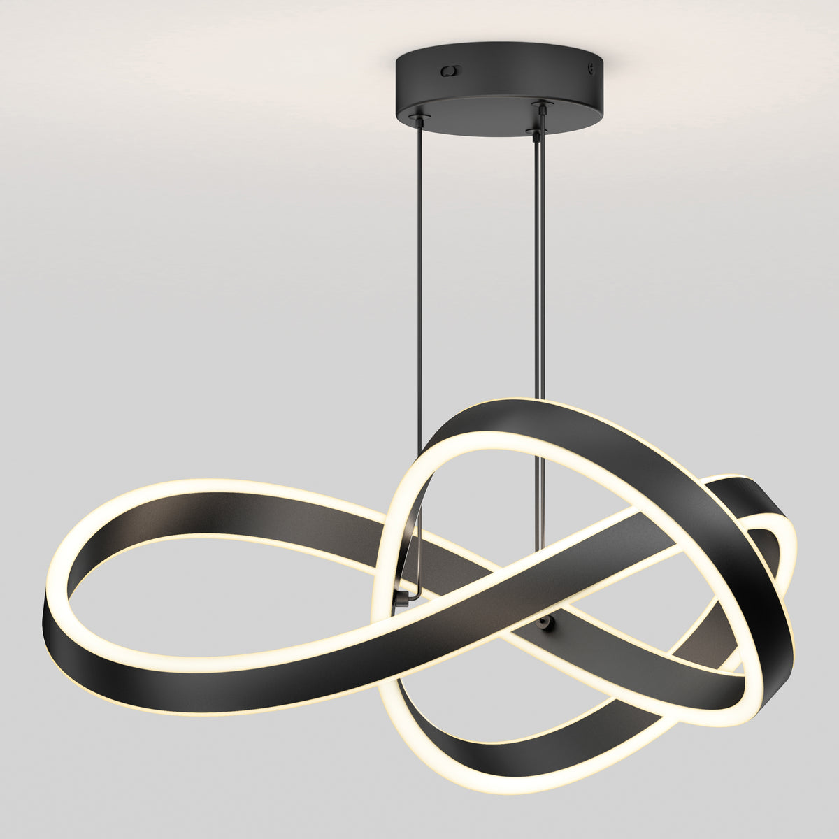 Modern ceiling light fixture with two intertwined, black metal loops outlined with white LED light, hanging from a round black base by two slim rods against a plain light gray background.