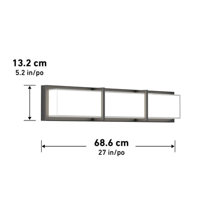 The Artika Subway LED bathroom vanity light is a rectangular wall-mounted fixture with three square glass panels and a dark frame, measuring 13.2 cm (5.2 in) tall and 68.6 cm (27 in) wide, as shown by labeled arrows.