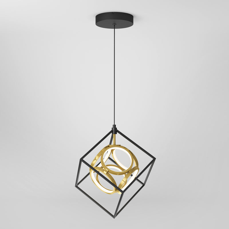 The Artika Mini Luxury LED pendant light features a modern black cube frame with gold circular rings inside, suspended from a black ceiling mount by a single cord, set against a white background.