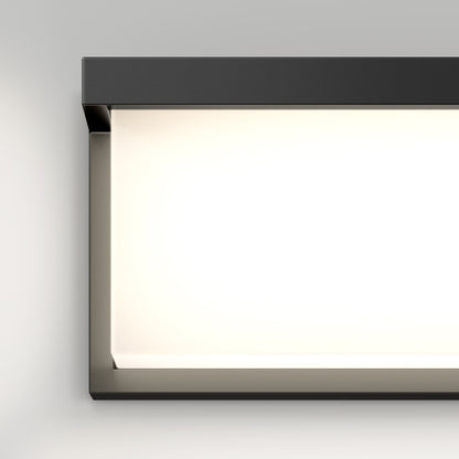 The Artika Bristol modern LED bathroom vanity light 3 CCT features a sleek rectangular black frame and bright white panel, shown mounted on a light gray wall.