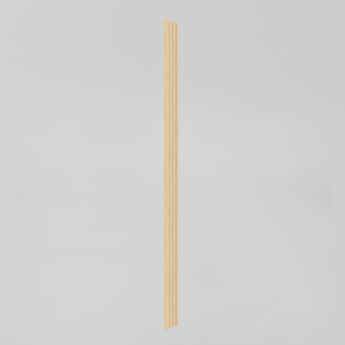 A vertical wooden trim piece with a grooved design stands against a plain white background.