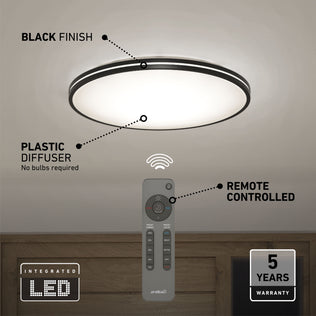 The Artika Athos 21 in. LED flush mount light, shown with a black finish and plastic diffuser, includes a remote control. Features: integrated LEDs (no bulbs needed), remote operation, and a 5-year warranty.