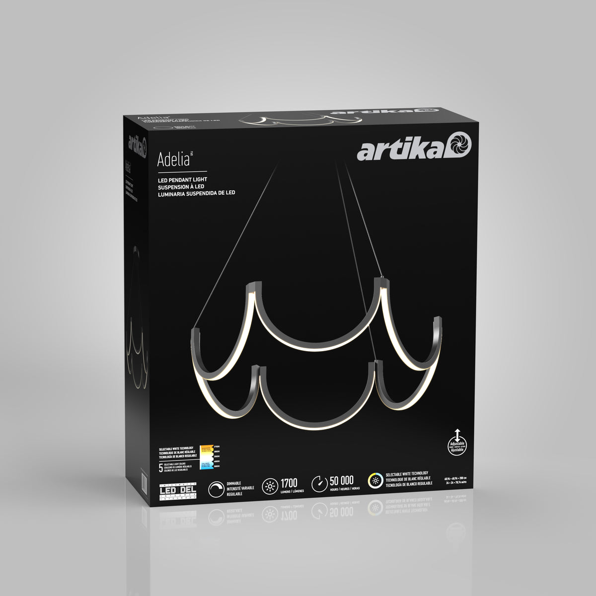 A black Artika box displays the Adelia LED pendant light, featuring a modern, sculptural design with curved illuminated arms. The front highlights LED features, brightness, and lifespan details against a gray background.