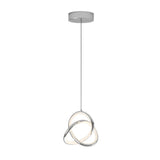 A modern pendant light with three interlocking, illuminated metal rings hanging from a thin cord attached to a round ceiling mount. The design is sleek and contemporary.