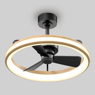 The Artika Lugano 23 in. LED modern ceiling fan features three black blades, a circular LED light ring with a wood finish, and comes with a remote, shown mounted on a gray ceiling.