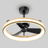 A modern ceiling fan with three black blades and a circular wooden LED light surrounding the blades, mounted on a black fixture against a plain gray background.