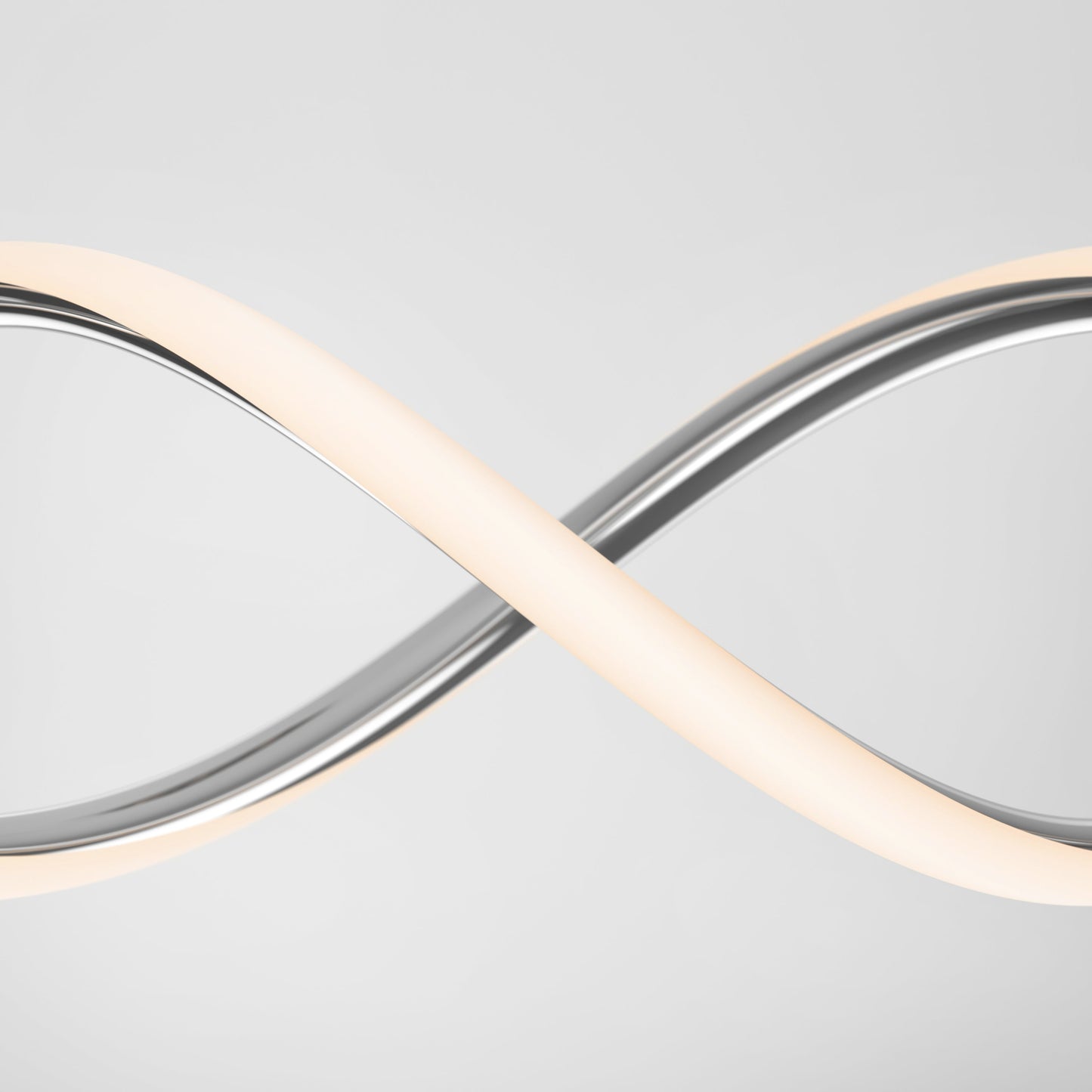 The DNA Linear LED modern pendant light by Artika-CAN-dev features intertwined metallic and illuminated bands with integrated LEDs, crafted in a sleek infinity shape, set against a plain light gray background.